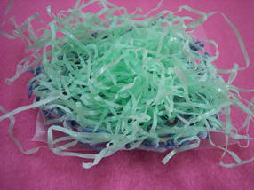 Attach Easter grass with white glue